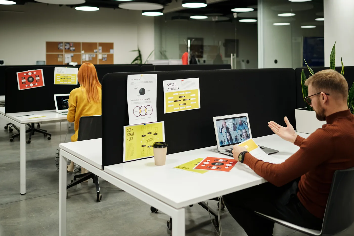 People working at desks in an office